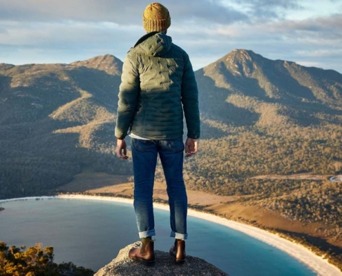 man standing on a rock